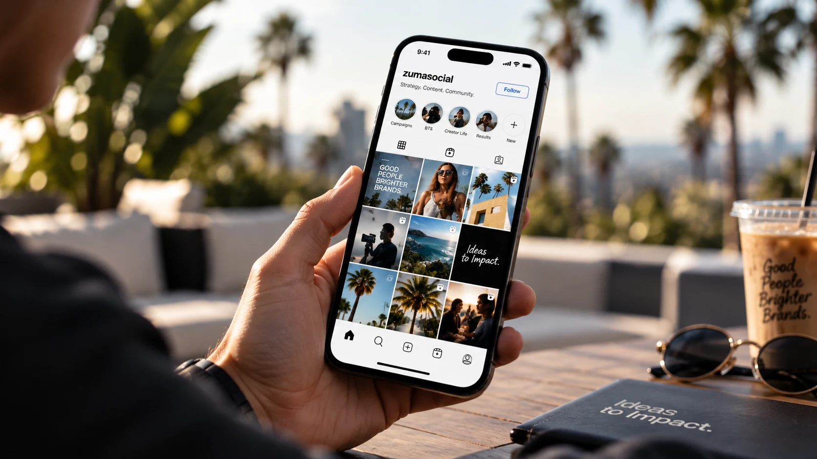 Smartphone displaying a grid of social media content.